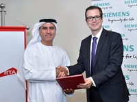 Representatives from Dubai RTA and Siemens shaking hands
