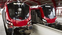 Two red metro trains