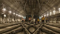 Workers inside metro tunnel