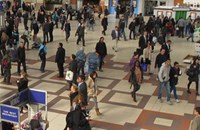 Busy train station concourse