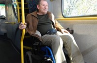 Man in wheelchair on bus