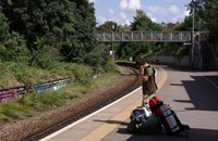 Person waiting on train platform