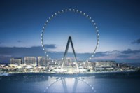 Large ferris wheel next to water