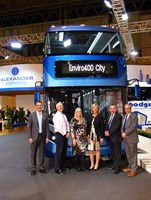 People standing in double decker blue bus