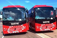 Front of two red buses