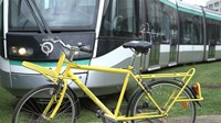 Bike in front of tram