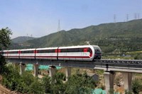 Train in front of mountains