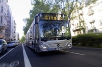 Sliver bus in city
