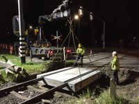 Construction workers putting in rails