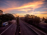 Sunset with bus in the foreground