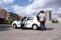 White car with people