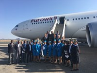Flight crew infront of Eurowings plane