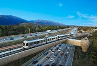 Metro train and line running over highway