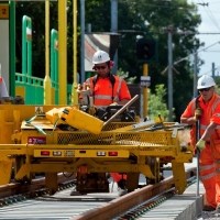 Workers working on rail modernisation