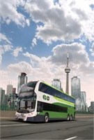 White and green bus with city background