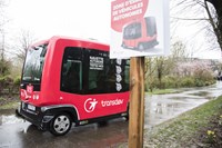 Red autonomous Transdev vehicle