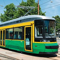 Green and yellow tram