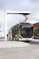 Electric bus at charging station